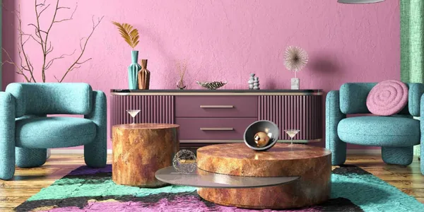 Living room colour harmony with pink walls, teal armchairs and wooden tables