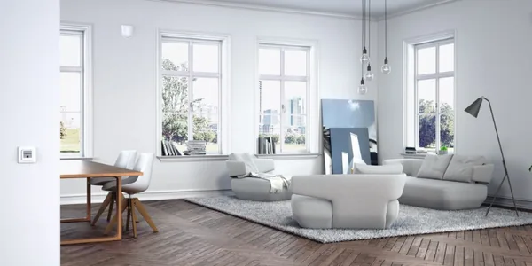 Bright living room with large windows allowing proper ventilation and air flow