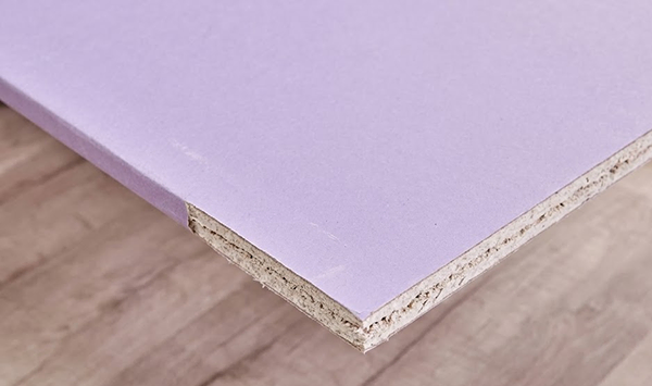 a purple drywall is shown in focus